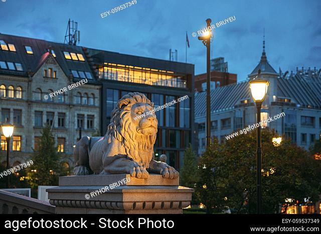 Oslo, Norway. Night View Of Lion Statue Near Storting Building. Parliament Of Norway Building