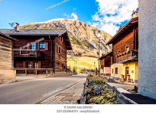 Street view on traditional Alpine wooden architecture in the village, wooden house, Livigno is a small town and ski centre for Italian Alps