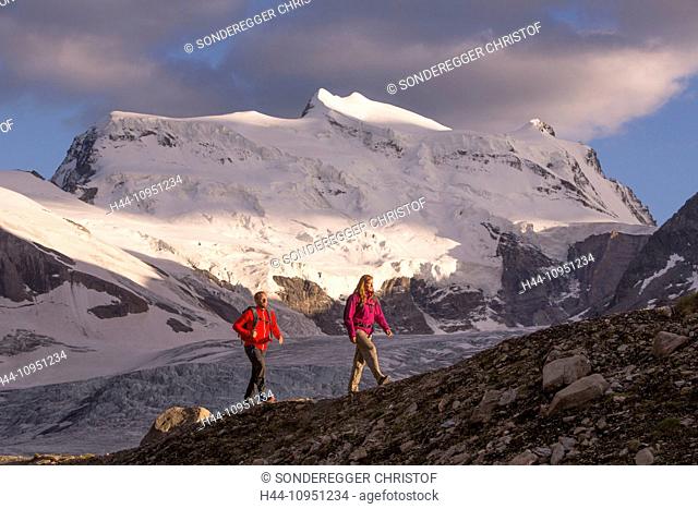 Switzerland, Europe, mountain, mountains, canton, Valais, glacier, ice, moraine, man, woman, couple, walking, hiking, Glacier de Combassiere, Grand Combin