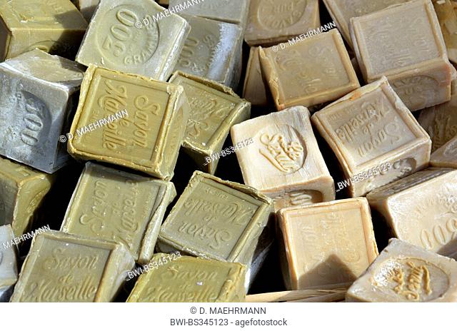 bars of soap of the traditional Marseille soap on a weekly market, France, Brittany