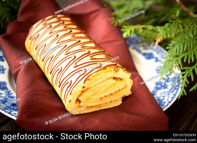 Buche de Noel is traditional French Christmas cake, golden yule log cake