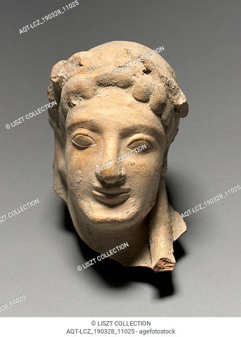 Head, 525 BC. Greece, Sicily, Selinus, 6th Century BC. Terracotta; overall: 12.2 x 9 x 11.8 cm (4 13/16 x 3 9/16 x 4 5/8 in.)