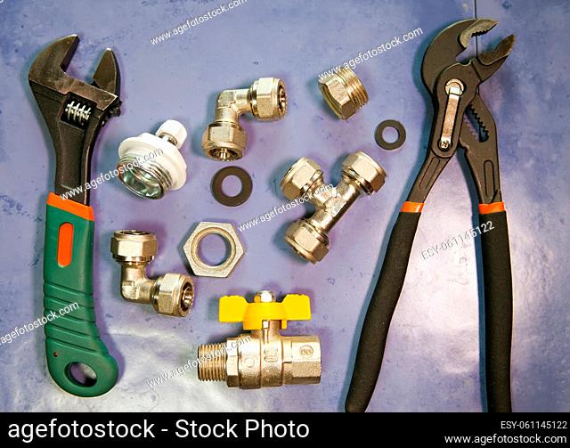 adjust wrench power grip, groove joint pillers and elements of water and gas shutoff valves, flat lay