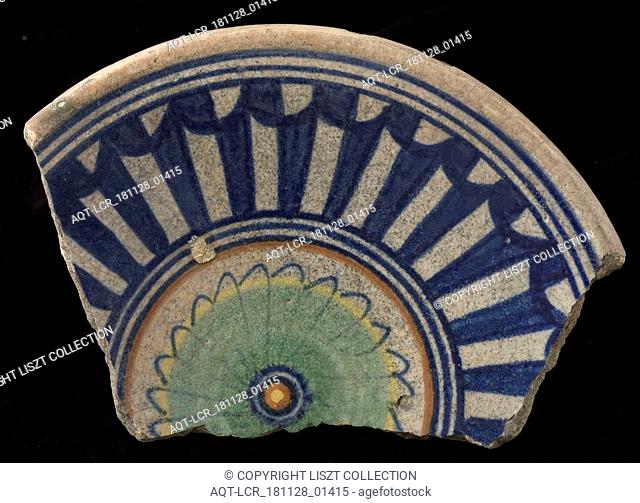 Fragment of the majolica dish, polychrome, in the middle rosette, surrounded by geometrical patterns, plate crockery holder soil find ceramic earthenware glaze