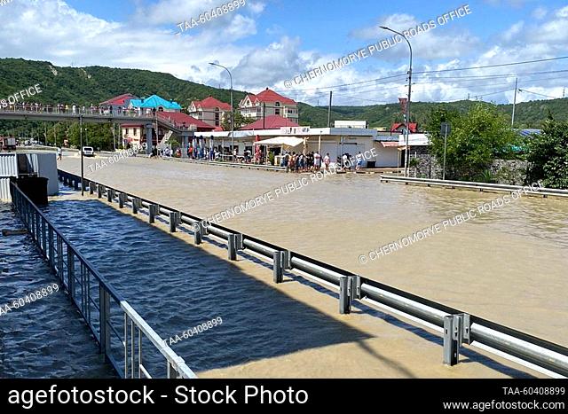 RUSSIA, KRASNODAR REGION - JULY 12, 2023: A view of a flooded area in the village of Lermontovo, Tuapse District. A section of the Russian route A147...