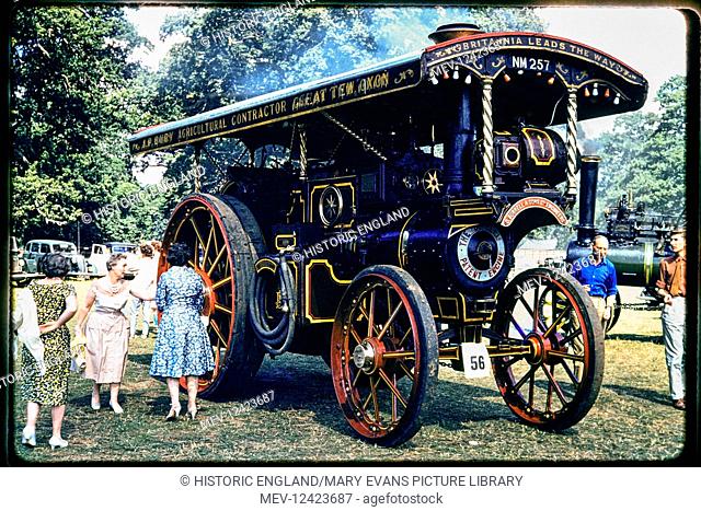 A stationary traction engine being inspected by members of the public, during an event in the grounds of Woburn AbbeyThis showman's road locomotive or engine...