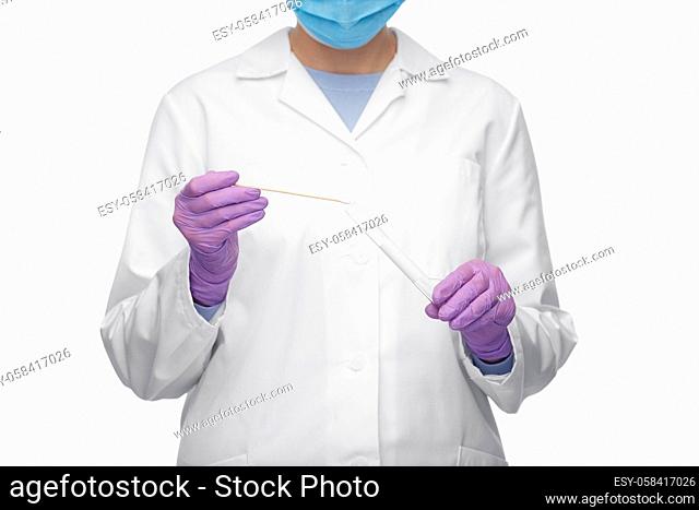 female doctor with test tube and cotton swab