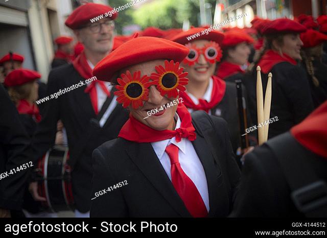 Women wearing flower glasses during the traditional 'Alarde de San Marcial' arm parade. Irun (Spain). June 30, 2023. The alarde is a parade that commemorates a...