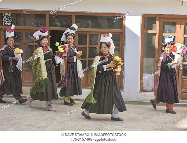 Ladakhi women in traditional dress at a Tara prayer gathering, Leh, Ladakh, India