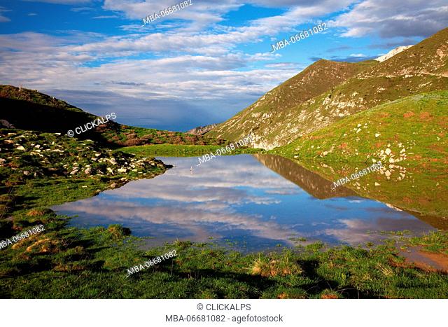 Branchino lake, Seriana valley, Bergamo province, Orobie regional park, Lombardy, Italy. A small lake near at Branchino lake, on flower trail of Arera peak