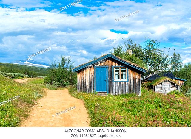 Mountain hut at a path in the swedish mountains
