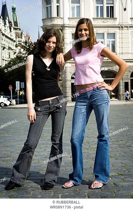 Portrait of two teenage girls standing