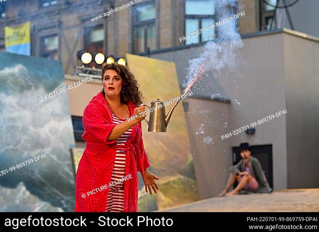 30 June 2022, Saxony-Anhalt, Magdeburg: Anna Wiesemeier from the ensemble of the Magdeburg Puppet Theater rehearsing a scene from the play ""Fireworks of Love""