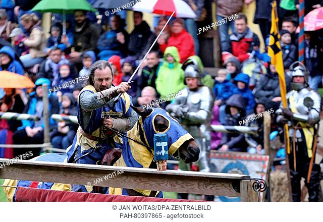 Actors from the Heureka Knights Festival perform various acts during the Pentecost Knights' Tournament in Trebsen, Germany, 15 May 2016