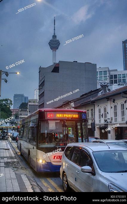 street scene with Kuala Lumpur Tower, Kuala Lumpur, Malaysia