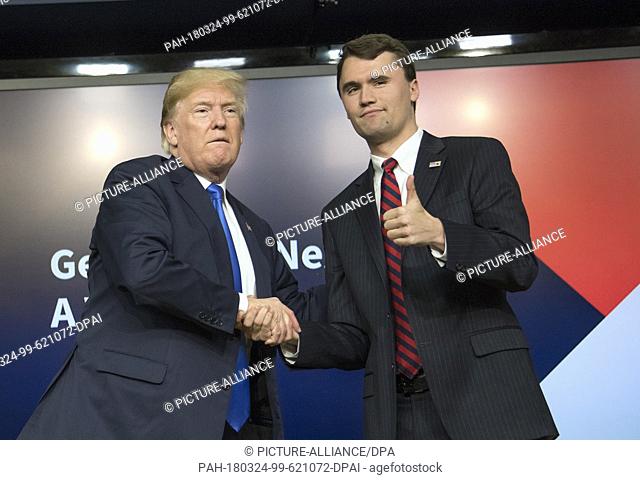 United States President Donald J. Trump, left, shakes hands with with Charlie Kirk, Founder and Executive Director of Turning Point USA, right