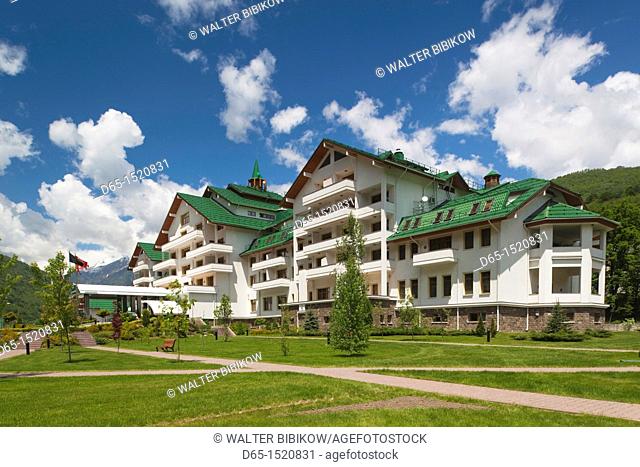 Russia, Caucasus Mountains, Sochi Area, Krasnaya Polyana, Gazprom Ski Resort, Grand Hotel Polyana, exterior, summer