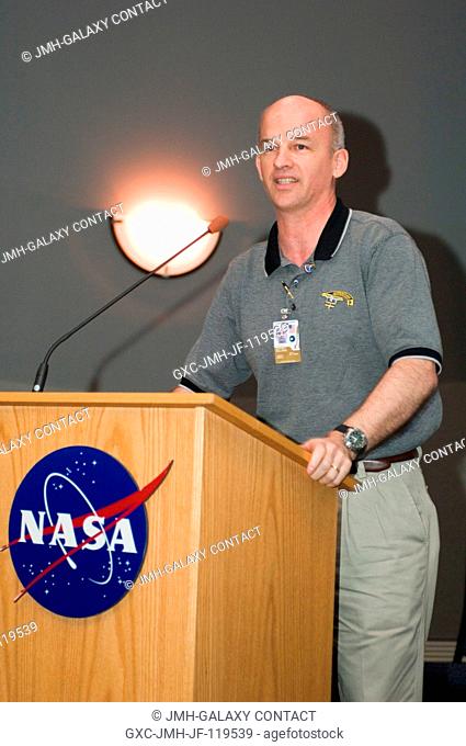 Jeffrey N. Williams, Expedition 13 NASA space station science officer and flight engineer, speaks from the lectern in the ballroom of the Gilruth Center at...