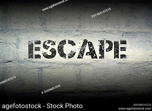 escape stencil print on the grunge white brick wall