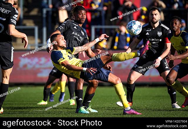 Eupen's Emmanuel Agbadou and Union's Loic Lapoussin fight for the ball during a soccer match between Royale Union Saint-Gilloise and KAS Eupen
