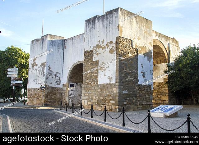 View of the iconic historical landmark arc entry located in the city of Faro, Portugal