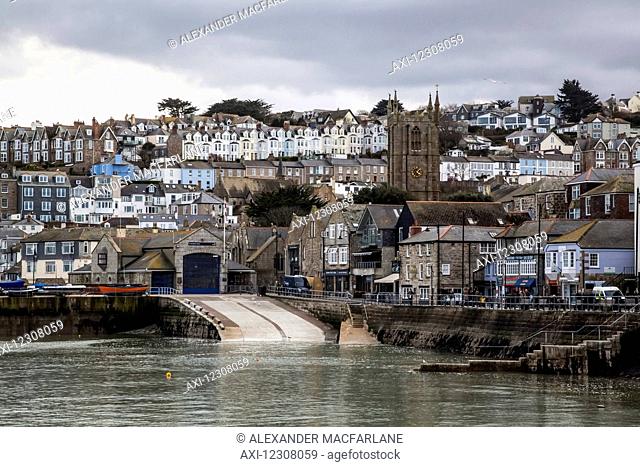 View of St. Ives and the boat launch in the harbour; St. Ives, Cornwall, England