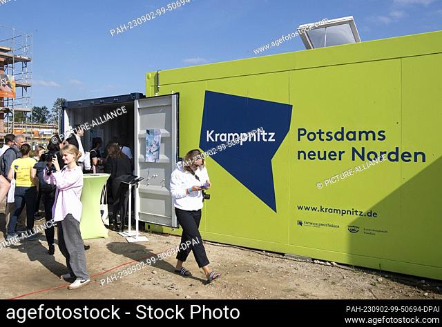 02 September 2023, Brandenburg, Potsdam: ""Krampnitz - Potsdam's new north"" is written on a container at the open house in the new Krampnitz residential...