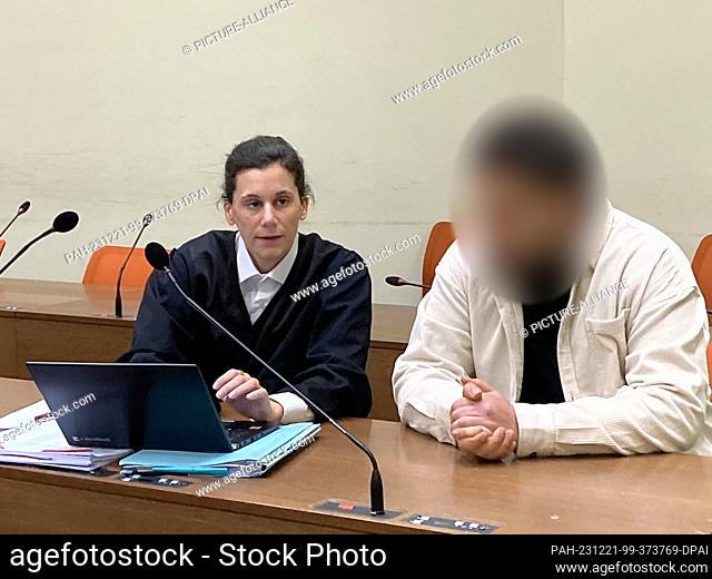 21 December 2023, Bavaria, Munich: A 22-year-old man and his lawyer Daniela Gabler are in the dock at Munich District Court on Thursday