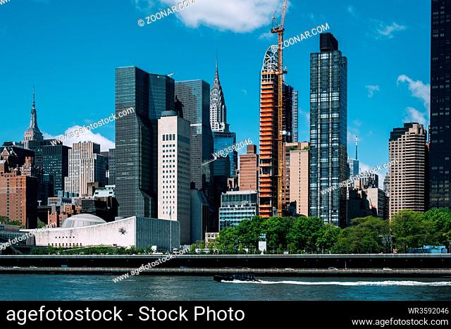 New York City - USA - May 15 2019: Midtown apartment buildings on east riverside view from Roosevelt Island