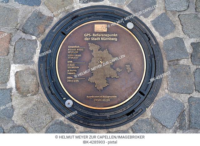 Manhole covers as a GPS reference point on the Hauptmarkt square, Nuremberg, Middle Franconia, Bavaria, Germany