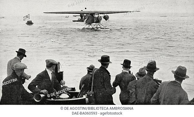 Amelia Earhart making a sea landing in Burry Port, Wales, after crossing the Atlantic Ocean by plane, June 17, 1928, from L'Illustrazione Italiana, Year LV
