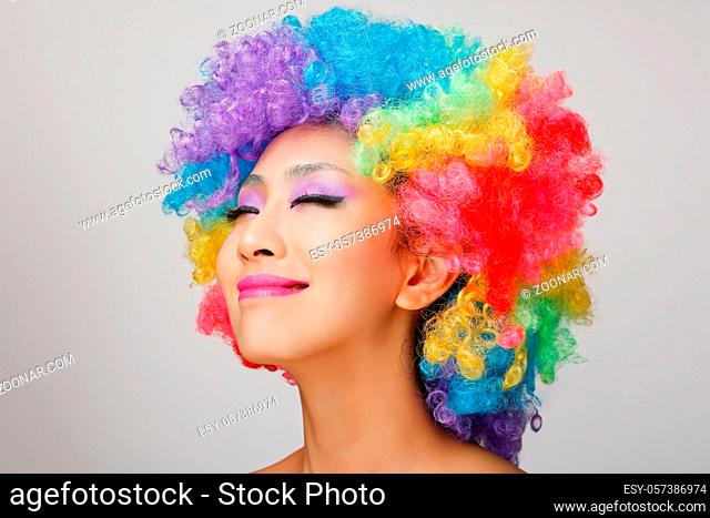 Wearing colored wig Oriental young lady high quality photo