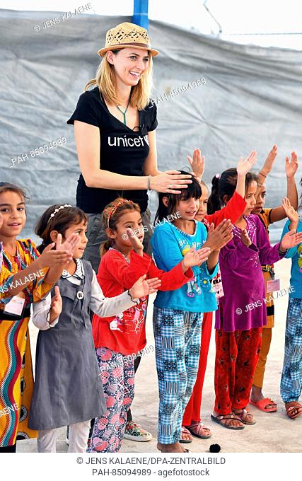 EXCLUSIVE - UNICEF ambassador Eva Padberg visits the Debaga refugee camp between Mosul and Erbil, Iraq, 18 October 2016. She is learning about the work of the...