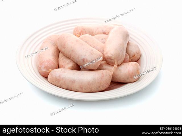 Plate of traditional bavarian white sausages isolated on white