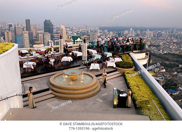 city view at night from the rooftop restaurant at the Lebua State Tower in Bangkok, Thailand