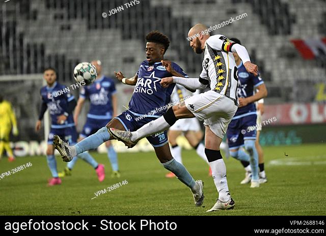 Mouscron's Nuno Da Costa and Charleroi's Dorian Dessoleil fight for the ball during a soccer match between Sporting Charleroi and Royal Excel Mouscron