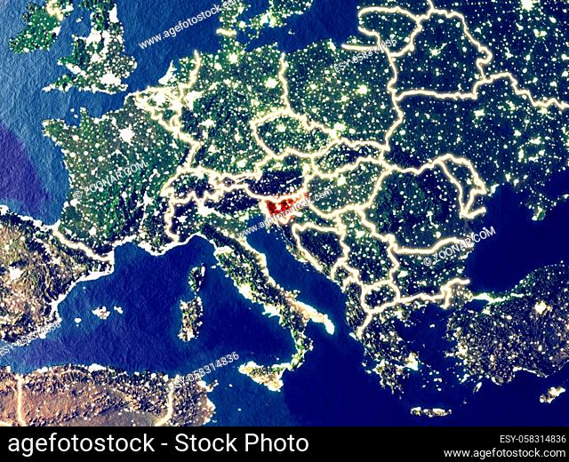 Slovenia from space on Earth at night. Very fine detail of the plastic planet surface with bright city lights. 3D illustration