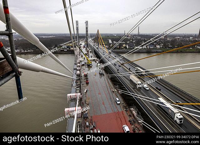PRODUCTION - 21 March 2023, North Rhine-Westphalia, Duisburg: The new Rhine bridge, photographed from a bridge pier and from a height of about 35 meters