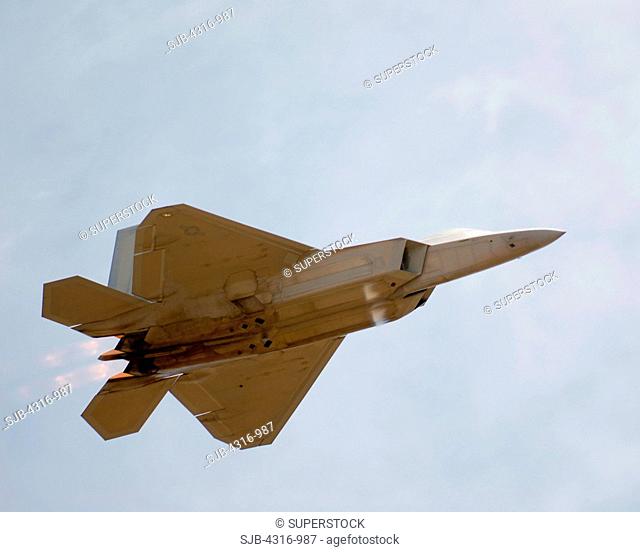 US Air Force F-22 Raptor Roars Through The Sky Under Full Afterburner