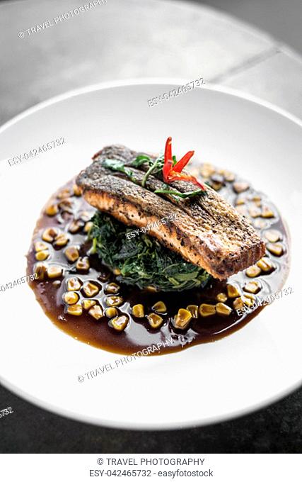 salmon fillet with steamed spinach and corn with sweet soy and oyster sauce