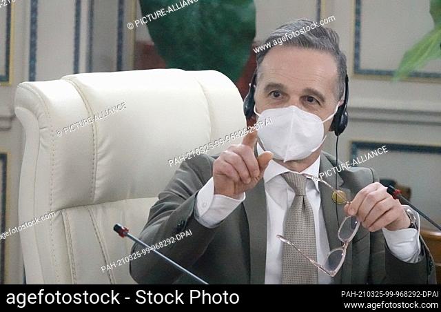 25 March 2021, Libya, Tripolis: Heiko Maas (SPD), Foreign Minister of Germany, takes part in talks. A few days after the swearing-in of Libya's interim...