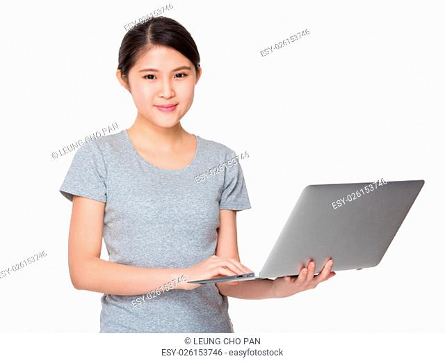 Young woman use of the laptop computer