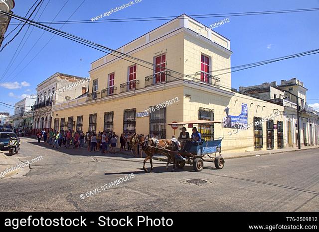 Horse cart taxi and lines, a staple of Cienfuegos, Cuba