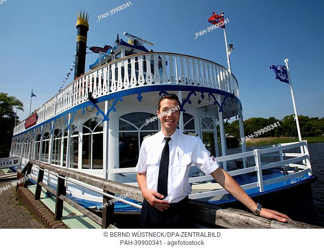 Tassilo Schäfer, captain of the Mississippi steamer 'River Star' of the shipping company Poschke is pictured in the bodden port of Prerow, Germany, 30 May 2013