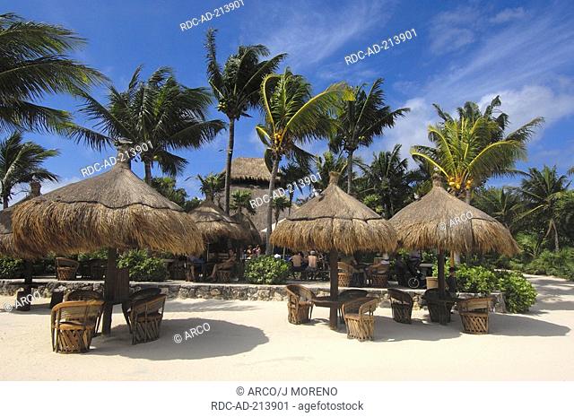 Sunshades and chairs on beach, beach area, Xcaret Ecological Park, near Playa del Carmen, Riviera Maya, Quintana Roo, Yucatan, Mexico