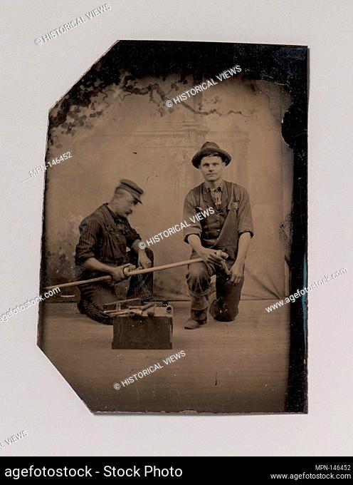 [Two Plumbers with a Pipe, Pipe Cutter, and Toolbox]. Artist: Unknown (American); Date: 1870s-80s; Medium: Tintype; Dimensions: Image: 9 x 6