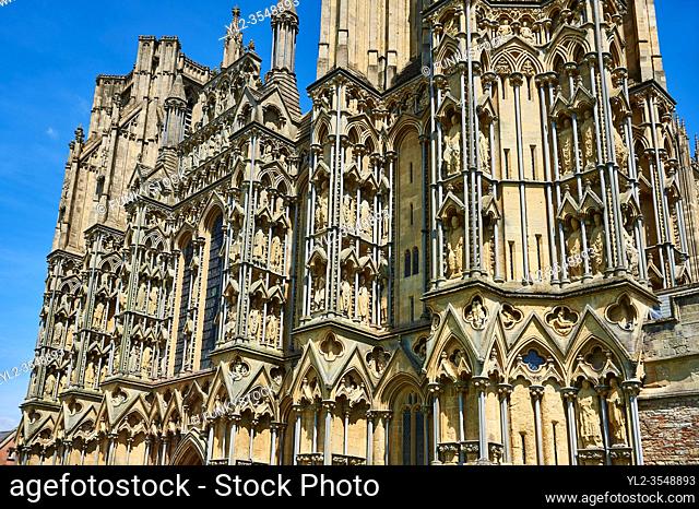 The facade of the the medieval Wells Cathedral built in the Early English Gothic style in 1175, Wells Somerset, England