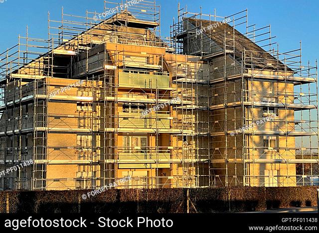 SCAFFOLDING FOR EXTERIOR RESTORATION AND RENOVATION WORK ON A SUBSIDIZED HOUSING APARTMENT BUILDING, RUGLES, EURE, FRANCE