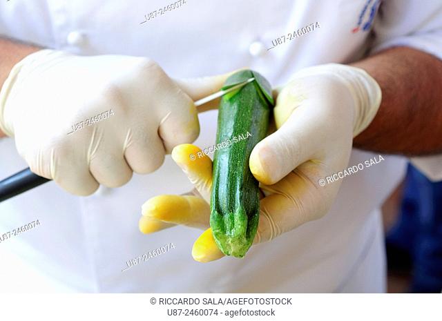 Chef Carving Courgette. .