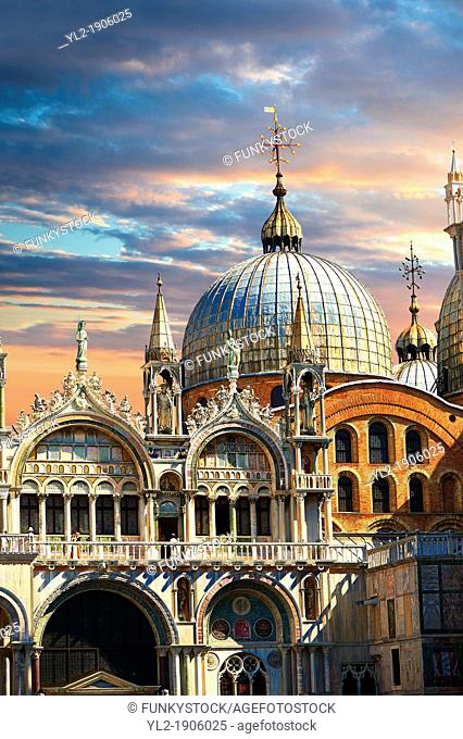 Facade with Gothic architecture and Romanesque domes of St Mark's Basilica, Venice